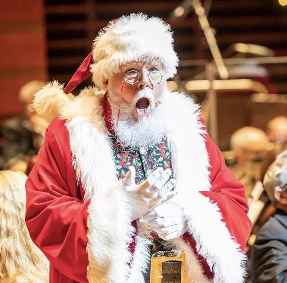 CJ Kringle singing into a microphone