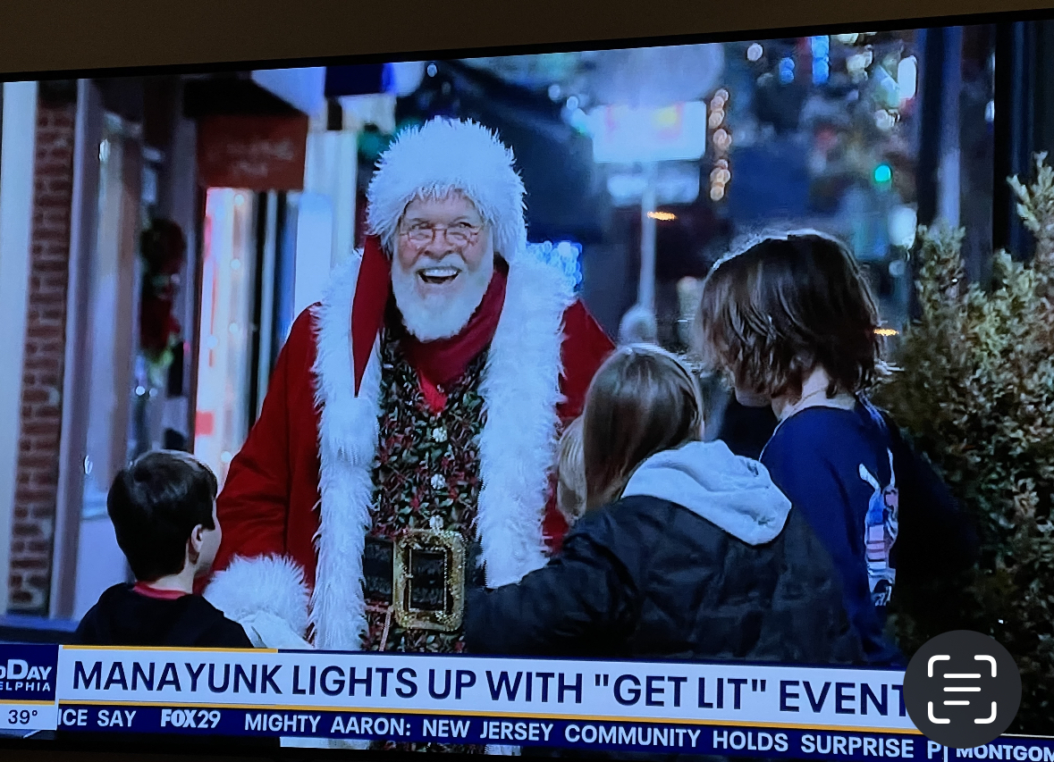 CJ Kringle in front of a winter window display